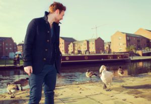 Tome feeding the birds along Manchester Canal https://canalrivertrust.org.uk/humans-of-the-waterways/tom-manchester